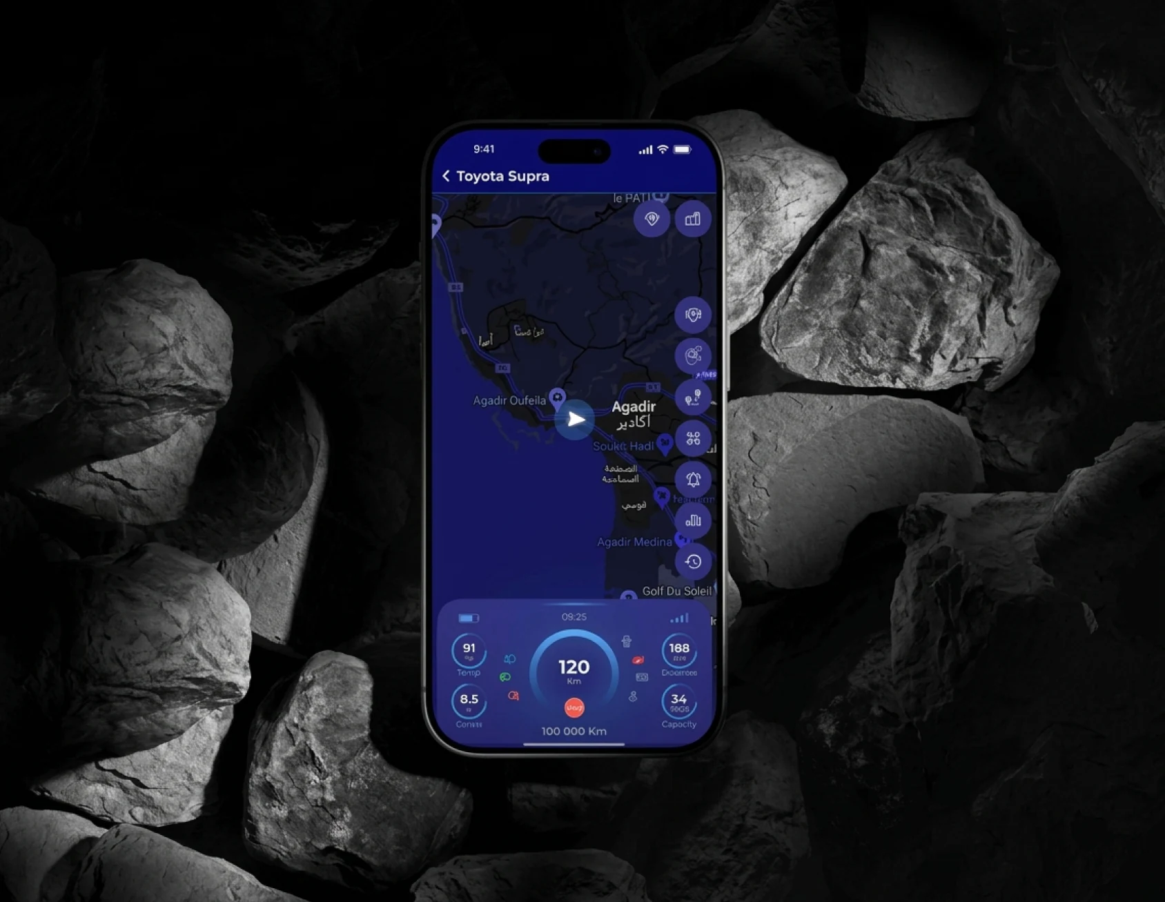Tracky vehicle tracking mobile app shown on a phone